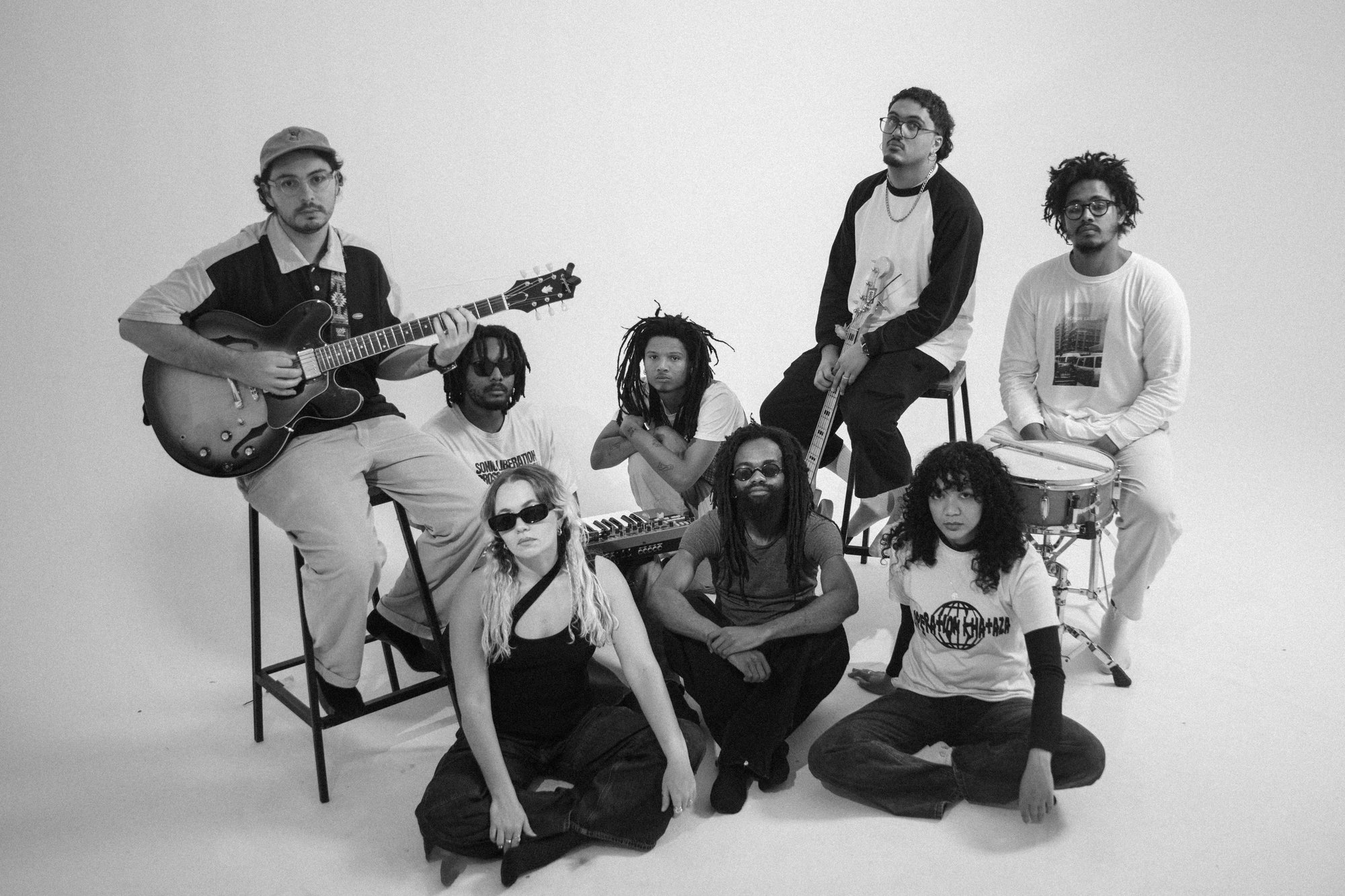 Operation Khataza — full band studio portrait, black and white