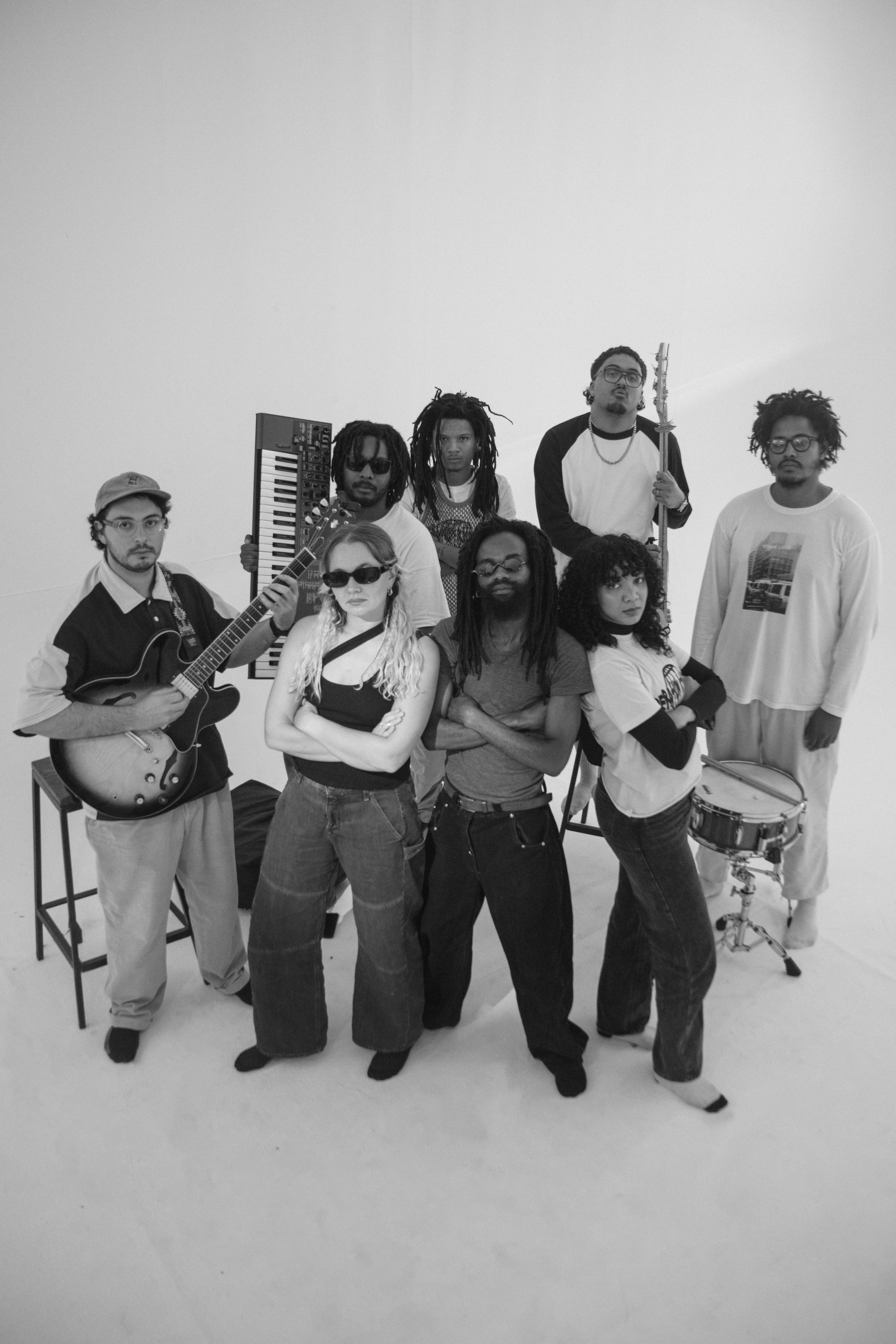 Operation Khataza — full band studio portrait, black and white
