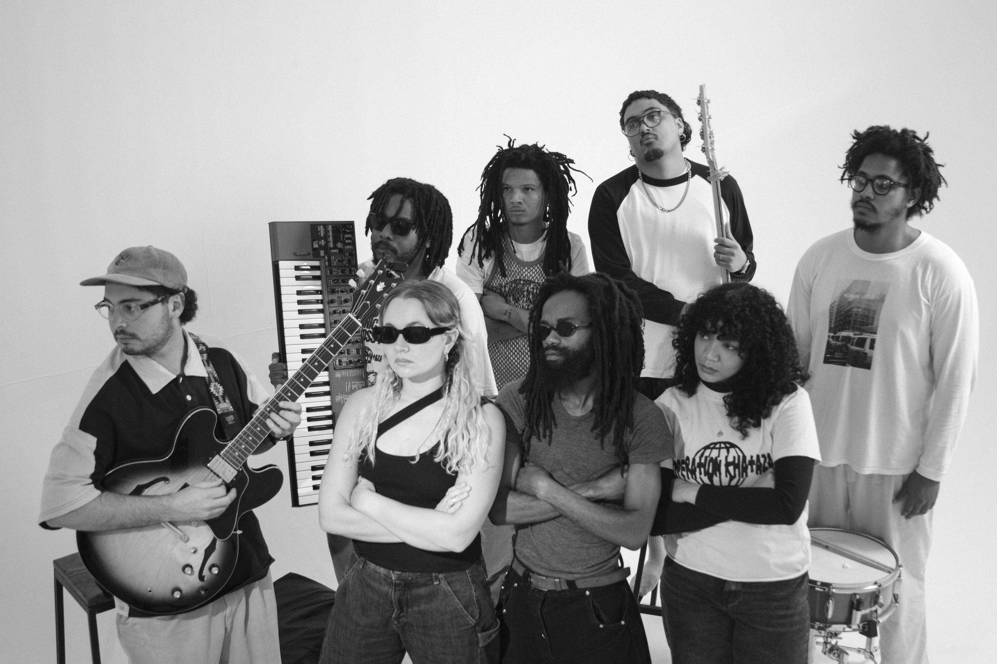 Operation Khataza — full band studio portrait, black and white