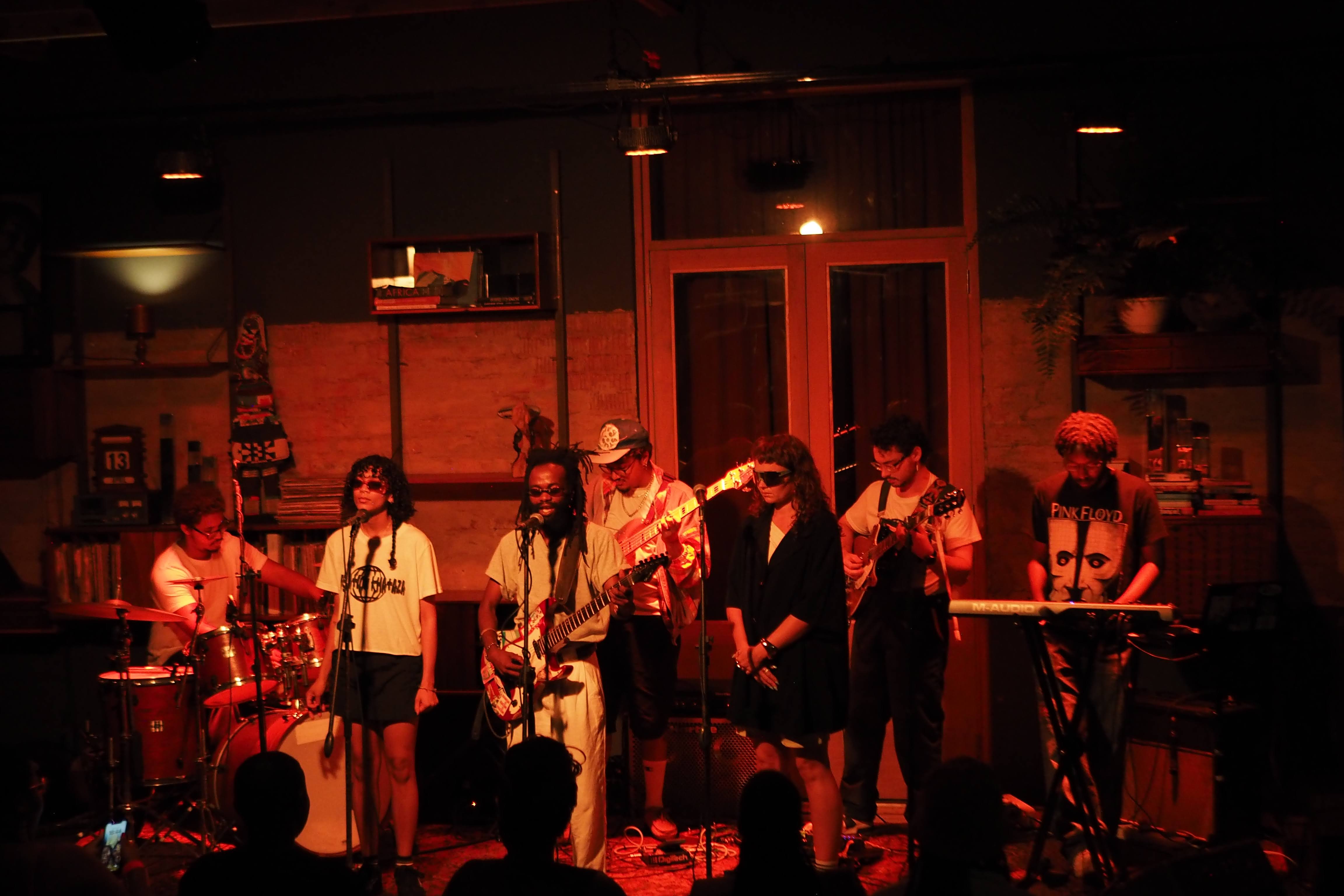 Operation Khataza live — black and white performance shot